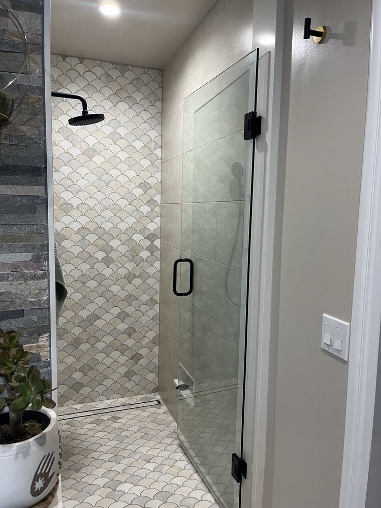 Finished shower interior by RG Drywall & Builder
