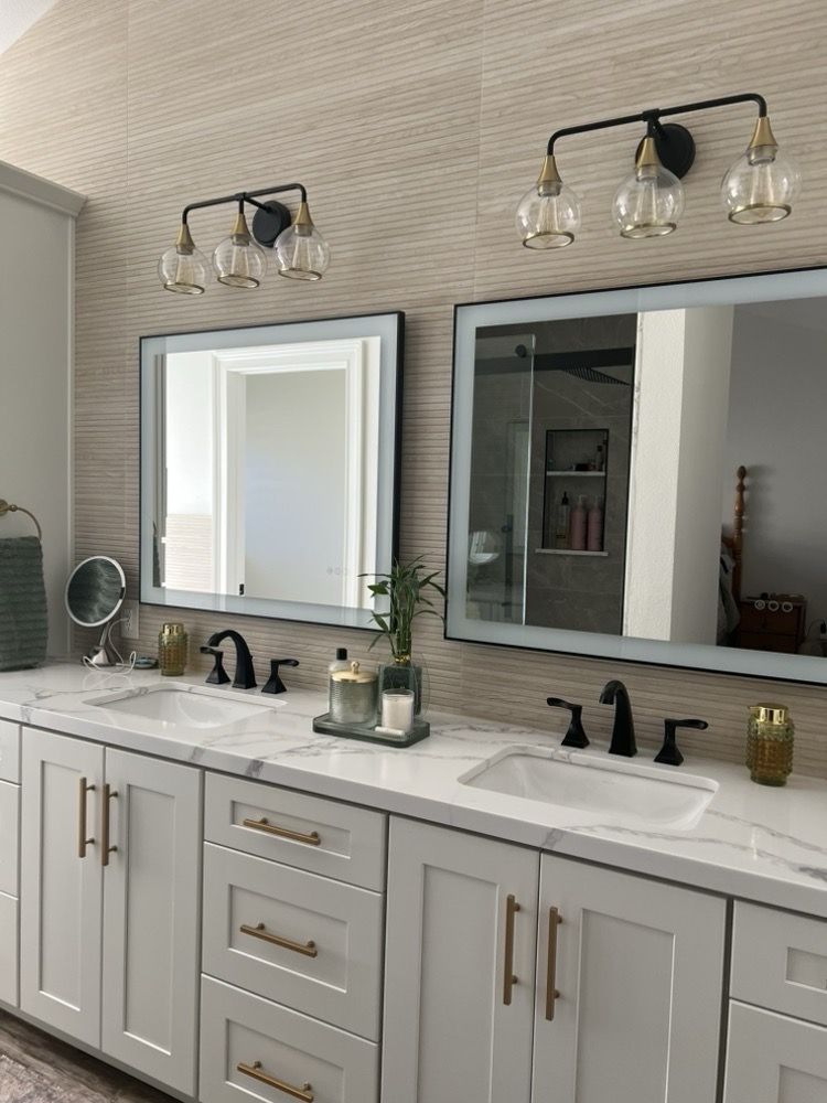 Finished bathroom vanity and wall surfaces